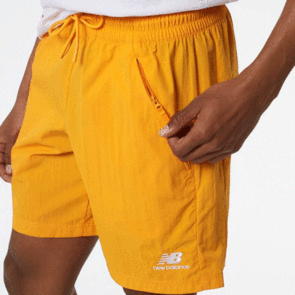 NEW BALANCE ATHLETICS WIND SHORT GOLDEN